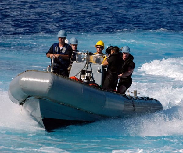 Aliphatic TPU - RIB BOAT TEAR - - Source - wiki commons https://commons.wikimedia.org/wiki/Category:Rigid-hulled_inflatable_boats#/media/File:US_Navy_050917-N-1332Y-189_Sailors_return_to_the_guided_missile_destroyer_USS_Fitzgerald_(DDG_62)_in_a_Rigid_Hull_Inflatable_Boat_(RHIB)_after_recovering_a_mock_victim_during_a_man_overboard_drill.jpg